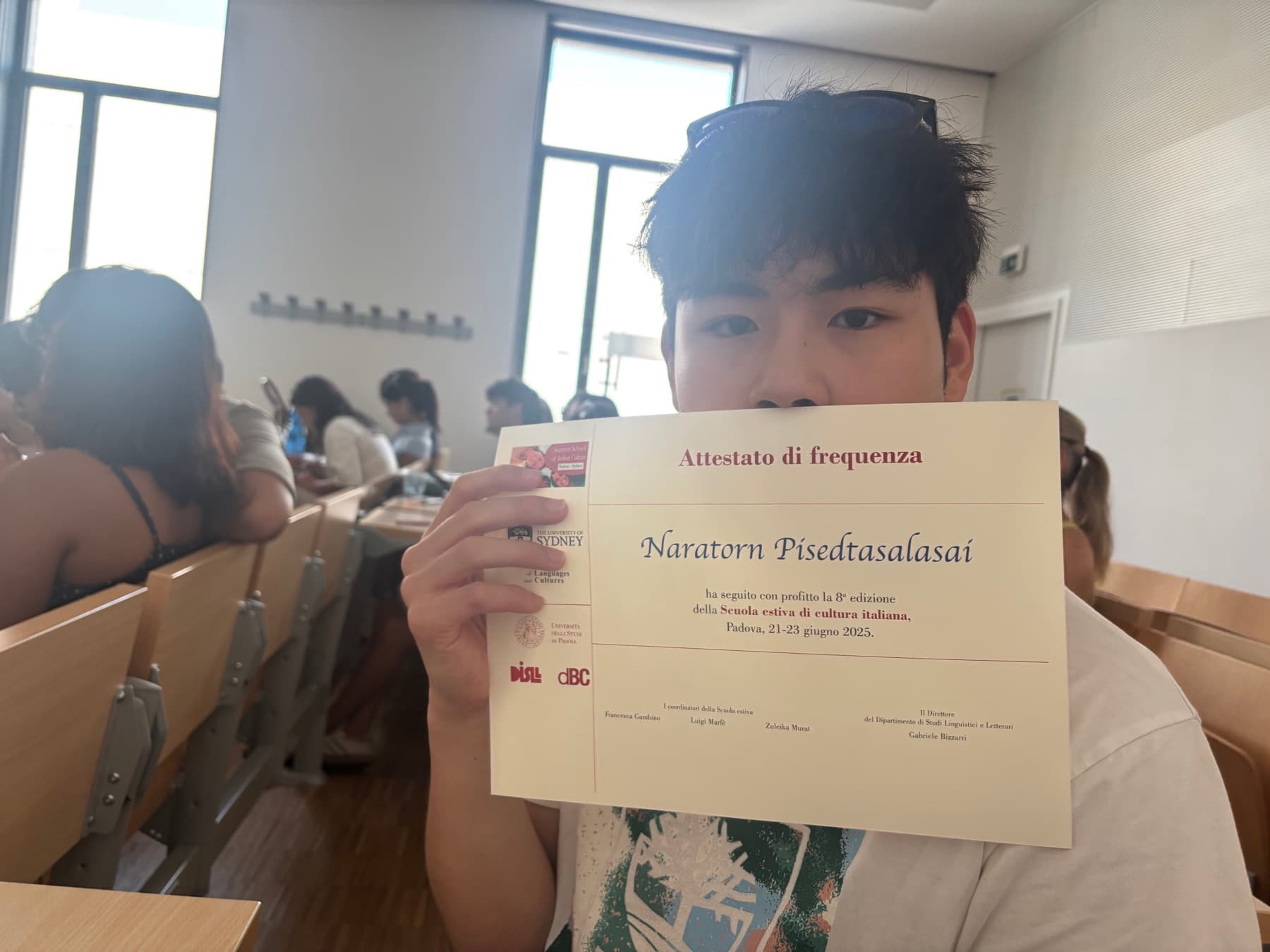 Holding the certificate from the Summer School of Italian Culture in Padova